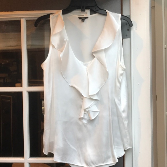 white satin sleeveless blouse